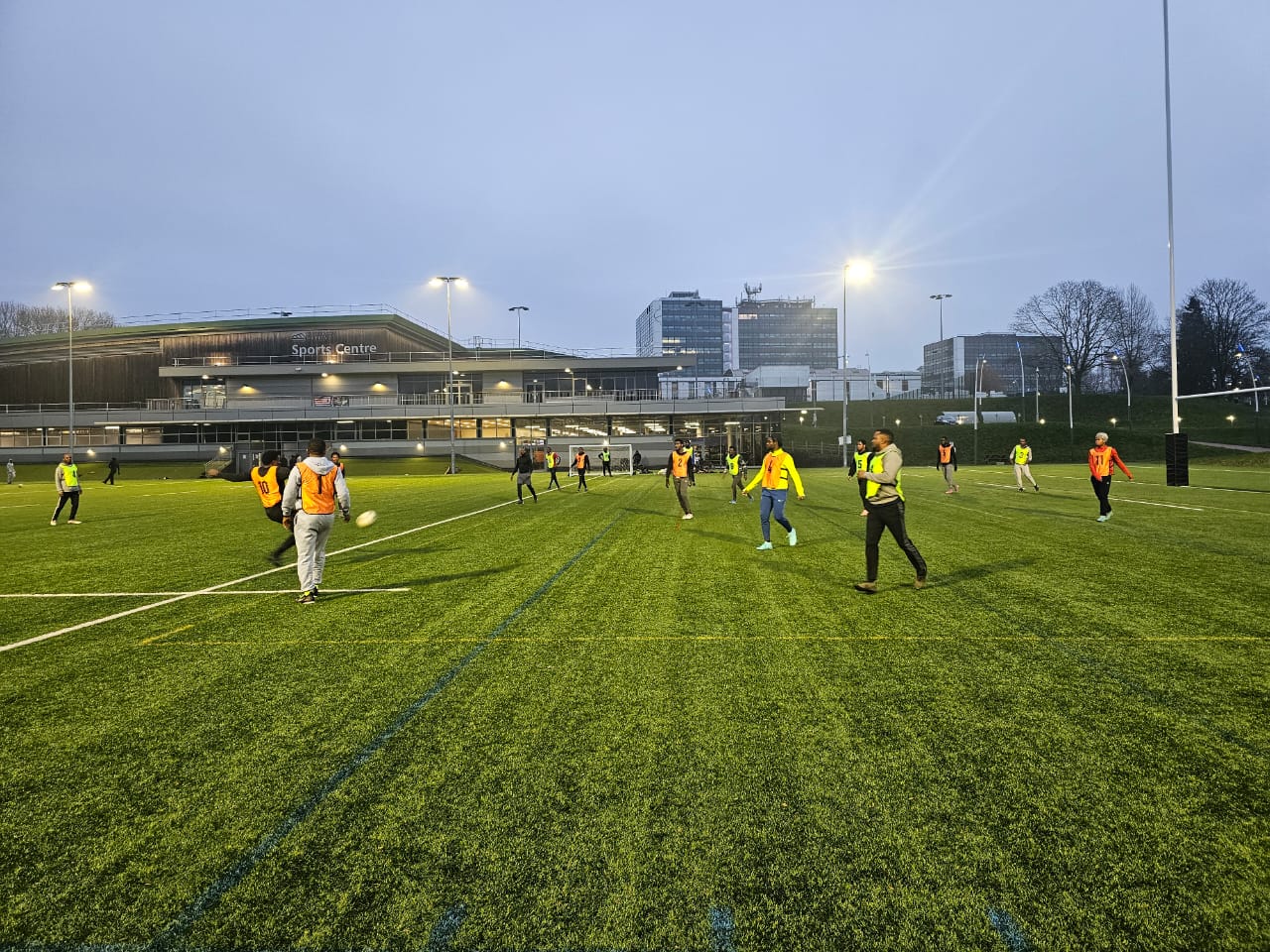 Participant in football bib on the pitch